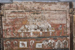 Title: Vaidyanatha Temple; Matavarvalakam, Srivilliputtur Date: Paintings: 17th centuryDescription: Top row: Shiva enthroned on Mt Kailasa whose slopes are populated by yogis and celestials. On right, at the foot of the mountain is Narada. Bottom row: Shiva creates the Ganga water tank, Surya bathes in it and worships Shiva - the rays of light fall over the god's image.  Location: Tamil Nadu Temple;Vaidyanatha Temple;Srivilliputtur Positioning: Mahamandapa, ceiling, west end