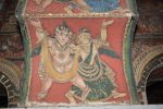 Title: Zamindar's Palace Date: mid-19th centuryDescription: Scene on the underside of the lobed arches: A gandharva and a gandharvi dancing.  Location: Tamil Nadu Palace;Bodinayakkanur Positioning: Darbar Hall