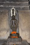 Title: Jaina Monuments; Tirumalai (Polur) Date: 10th (?) centuryDescription: Image of the Jain saviour Parshvanatha enshrined in a structure on top of theTirumalai hill. Location: Tamil Nadu Temple;Jaina Monuments;Tirumalai Positioning: Hilltop shrine