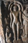 Title: Jaina Monuments; Tirumalai (Polur) Date: 10th centuryDescription: Rock-cut image of Parshvanatha. Location: Tamil Nadu Temple;Jaina Monuments;Tirumalai Positioning: Jaina rock-cut shrines, Parshvanatha shrine