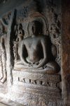 Title: Jaina Monuments; Tirumalai (Polur) Date: 10th centuryDescription: Rock-cut sculpture of Mahavira. Location: Tamil Nadu Temple;Jaina Monuments;Tirumalai Positioning: Jaina rock-cut shrines, Parshvanatha shrine