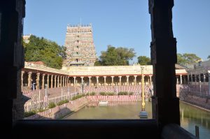 Title: Minakshi Sundareshvara Temple; Madurai Date: 17th-18th centuriesDescription: View of the Chitra gopura and the Potramarai tank from the Kilikuttu mandapa. Location: Tamil Nadu Temple;Minakshi Sundareshvara Temple;Madurai Positioning: Potramarai tank