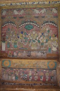 Title: Minakshi Sundareshvara Temple; Madurai Date: c. 1700Description: Top: The wedding of Minakshi and Sundareshvara. Bottom: Minakshi gives the sceptre to Queen Mangammal via an intermediary priest at the presence of attendants and courtiers. Location: Tamil Nadu Temple;Minakshi Sundareshvara Temple;Madurai Positioning: Kilikuttu mandapa, ceiling