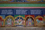 Title: Andal Temple; Srivilliputtur Date: Paintings, late 20th centuryDescription: 108 Srivaishnava divyadeshams. 1) Kallalagar of Tirumalirunjolai (Alagar Koyil) standing, flanked by Komalavalli Nacchiyar and Sridevi;  2) Kudalalagar of Madurai, seated, flanked by Maduravalli Nacchiyar and Marakatavalli Nacchiyar; 3) Kalamegha Perumal of Tirumokur standing, flanked by Tirumokurvalli Nacchiyar and Meghavalli Nachiyar; 4) Sri Tadavaraimel (?) of Tirumeyyam (Tirumayam)  reclining on Shesha, with his consort standing at his feet. Location: Tamil Nadu Temple;Andal Temple;Srivilliputtur Positioning: Inner prakara, south wall