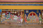 Title: Andal Temple; Srivilliputtur Date: Paintings, late 20th centuryDescription: 108 Srivaishnava divyadeshams. 1) Sri Anantapadmanabha of Tiruvananthapuram, reclining on Shesha, with Garuda standing at his feet and his weapons in the background. Brahma emerges from the lotus issuing from Anantapadmanabha's navel. On the foreground are (from left) seated Shiva, Sri Hari Lakshmi Thayar, an ascetic and a devotee. 2) Sri Tiruvalimarbal of Tiruvanparisaram seated, flanked by his consorts. On the left is Udayanankai (mother of Nammalvar), on the right Kari Rajan (Nammalvar's father). In the upper corner left: the Lakshmi tirtham and on the right, the Nammalvar shrine. Location: Tamil Nadu Temple;Andal Temple;Srivilliputtur Positioning: Inner prakara, south wall