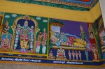 Title: Andal Temple; Srivilliputtur Date: Paintings, late 20th centuryDescription: 108 Srivaishnava divyadeshams.  1) Sri Pundarikaksha Perumal of Tiruvellarai, flanked by Pankayacchelvi Nacchiyar on the left and by Sri Uyyakkontan(Veyakkondan acharya) and Enkalalvan acharya on the right. The most important tirhas -shown at the top- are (from left): Divyapushkarini, Pushkala tirtha; Kusha tirtha; Chakra tirtha. 2) Sri Purushottama ofTirukarambanur (Uthamar Koyil) reclining on Shesha, and from left to right: Kadamba maharishi, Purvadevi Nacchiyar, Sanakatigal (Sanatkumaras, the four mind-born sons of Brahma), Tirumangai Mannan, Bhikshatana, and top right, Brahma in a shrine. King Janaka (?) is depicted at the feet of the deity. Location: Tamil Nadu Temple;Andal Temple;Srivilliputtur Positioning: Inner prakara, south wall