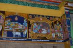 Title: Andal Temple; Srivilliputtur Date: Paintings, late 20th centuryDescription: 108 Srivaishnava divyadeshams.  1) Sri Andalakkum Aiyan of Tiru Adanur reclining on Shesha. Brahma emerges from the lotus issuing from Andalakkum's Aiyan's navel; In the foreground are: Ranga Nacchiyar, Kamadhenu and Kaliyan (Tirumangai alvar). 2) Sri Aravamutan (Sarangapani) of Tirukkudandai (Kumbakonam), reclining on Shesha in his chariot-shaped sanctuary. Brahma emerges from the lotus issuing from Aravamutan's navel. On the left is Hema maharishi (Bhrigu Maharishi) and on the right, Tirumalisai alvar. In the top left corner is the shrine of Komalavalli Thayar. 3) Sri Uppiliyappan of Tirunagesvara/Tiruvinnagaram (Uppiliyappan Koyil), standing and, on the left, Bhu Devi. On the right: Garuda; Markandeya maharishi and two goddesses. Location: Tamil Nadu Temple;Andal Temple;Srivilliputtur Positioning: Inner prakara, west wall