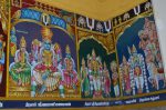 Title: Andal Temple; Srivilliputtur Date: Paintings, late 20th centuryDescription: 108 Srivaishnava divyadeshams; 1) Sri Vayalali Manavalan, of Tiruvali/Tirunagari seated flanked by his consorts, on the left, Nikanjaprajapati. In the upper left corner is Amritaghatavalli Nacchiyar and in the right corner the gods worship Vishnu during the Vedupari festival and the Ahatani pushkarini (tank). 2) Sri Alagiyasingar (?) of Tirunagari/Tiruvali, standing flanked by his consorts, on the right a rishi (?);  3) Tirumangai alvar, his consort Kumudavalli and his followers (part of the Tirunagari/Tiruvali legend). Location: Tamil Nadu Temple;Andal Temple;Srivilliputtur Positioning: Inner prakara, west wall, north corner
