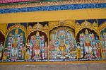 Title: Andal Temple; Srivilliputtur Date: Paintings, late 20th centuryDescription: 108 Srivaishnava divyadeshams. 1) Sri Purushottama of Tiruvanpurudottam (Tirunganur) standing  flanked by Purushottama Nacchiyar and an ascetic. 2) Sri Manikkudam Nayakan of Tirumanikkudam (Thirunganur) standing flanked by Tirumamakal Nacchiyar and Chandra, on the left, and Vaidyanathan on the right. The inscription mentions the Chandra pushkarini (tank). 3) Sri Vaikuntha Perumal of Tiruvaikunta Vinnagaram (Thirunangur) seated on the coils of the serpent Shesha, with his three consorts. In the foreground, from left are: Utanka maharishi, Vishnu ratham (Garuda), Uparishravas chakravarti. 4)Sri Madava Perumal of Tiruttokai  (Tiruttevanarthogai, Tirunganur) standing. On the left is the consort  goddess. On the right are Arundhati Amman and Brahma putiram. The inscription mentions the Sobhana pushkarini (tank). Location: Tamil Nadu Temple;Andal Temple;Srivilliputtur Positioning: Inner prakara, north wall