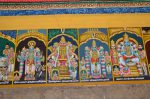 Title: Andal Temple; Srivilliputtur Date: Paintings, late 20th centuryDescription: 108 Srivaishnava divyadeshams. 1) Sri Adikesava Perumal of Sri Attabhuyakaram (Kanchipuram)  standing. In the foreground, the consort goddess , and on the right, Gajendra and Garuda.  2) Sri Narahari Perumal (Yoga Narasimha) of Tiruvelukkai (Kanchipuram), flanked by Bhrigu maharishi on the left, Prahlada on the right and Velukkaivalli Nacchiyar in the foreground. 3) Sri Battaravi Perumal (Dipaprakasar) of Tiruttanka (Kanchipuram), standing, flanked on the left by Sarasvati and Sri Markatavalli Nacchiyar, and, on the right, by Vedantacharya (Vedanta Desika). 4) Sri Pandavardudan (Pandava Dudan) of Tiruppadakam (Kanchipuram) seated, flanked by King Janaka (?) and the consort goddess on the left and Haritha muni (?) on the right. Location: Tamil Nadu Temple;Andal Temple;Srivilliputtur Positioning: Inner prakara, north wall