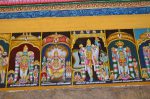 Title: Andal Temple; Srivilliputtur Date: Paintings, late 20th centuryDescription: 108 Srivaishnava divyadeshams. 1) Sri Karunakara Perumal, of Tirunilatingal Tundam (Kanchipuram)   standing flanked on the left by his consort, and on the right by Ardhanarishvara. The inscription mentions the Chandra pushkarini (tank). 2) Sri Palavannan of Tiru Palavannan (Kanchipuram) seated on Shesha, flanked on the left by Parvati, standing, and Palavavalli Nacchiyar in her shrine and, on the right, by the Ashvins. The inscription mentions the Chakra tirtha. 2) Sri Ulagalanda Perumal of Tiru Uragam (Kanchipuram) standing. His left foot is lustrated by Brahma. He is flanked on the left by Shesha and Sri Amudavalli Nacchiyar, and by Sukra, Bali chakravarti and Shiva, on the right. 3) Sri Karunakara Perumal of Tiruvachakam (Thirukarakam, Kanchipuram) standing, flanked by Sri Padmamani Nacchiyar on the left, and by Karmegan (? Garga) rishi on the right. Location: Tamil Nadu Temple;Andal Temple;Srivilliputtur Positioning: Inner prakara, north wall