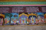 Title: Andal Temple; Srivilliputtur Date: Paintings, late 20th centuryDescription: 108 Srivaishnava divyadeshams. 1) Sri Radhakrishna in Vrindavanam with Radha on the banks of the Yamuna and Govardhanan (Govardhanadhara) flanked by cowherds and cows, on the left, and by Yadava cowherds on the right. 2) Sri Navamohana Krishnan (Manamohana Krishna) of Gokul, flanked by Rukmini on thel left, and Devaki and Vasudeva, on the right. 3) Sri Nilamegha Perumal of Kandamenum Katinagar (Thirukandaghatinagar, i.e. Deva Prayag) standing flanked by Bharadvaja muni on the left and Pundarikavalli Thayar on the right. In the left upper corner is the Vishnuganga (Alakaganga) and in the right upper corner the Bhagirathi river. The two rivers meet at Deva Prayag and become the Ganga. 4) Sri Adinarayana of Haridwara seated on Shesha with Adilakshmi Thayar. In the upper left corner, Bhagiratha (?); In the upper right corner, the sage Shuka. Location: Tamil Nadu Temple;Andal Temple;Srivilliputtur Positioning: Inner prakara, north wall