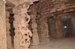 Title: Narumpunatha Temple; Tiruppudaimarudur Date: mid-17th centuryDescription: Second tier, transept, view form south east to north west. The wooden sculptures show Virabhadra (lin the foreground) and Purushamriga (in the background). Location: Tamil Nadu Temple;Narumpunatha Temple;Tiruppudaimarudur Positioning: Gopura, second tier, transept