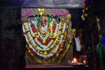 Title: Virabhadraswamy Temple; Lepakshi Date: First half of the 16th centuryDescription: Decorated image of Durga in the north west corner of the mahamandapa (reflected in the mirror placed opposite the actual image). Location: Andhra Pradesh Temple;Virabhadraswamy Temple;Lepakshi Positioning: Mahamandapa, northwest corner