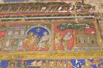 Title: Atmanatha Temple; Avudaiyarkoyil (Tirupperunturai) Date: Paintings: late 19th, early 20th centuryDescription: Top row: The parents of Manikkavachakar, whose real name was Tiruvatavurar, i.e. "he of Tiruvatavur", worship Shiva; They are blessed with a son.  Location: Tamil Nadu Temple;Atmanatha Temple;Avudaiyarkoyil Positioning: Sivananda Manikkavachakar shrine; south face