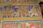 Title: Atmanatha Temple; Avudaiyarkoyil (Tirupperunturai) Date: Paintings: late 19th, early 20th centuryDescription: Second row: Manikkavachakar as prime minister of Arimarttana Pandya (Varagunavarman II) rides in state. Location: Tamil Nadu Temple;Atmanatha Temple;Avudaiyarkoyil Positioning: Sivananda Manikkavachakar shrine, south face