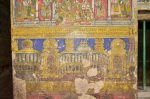 Title: Atmanatha Temple; Avudaiyarkoyil (Tirupperunturai) Date: Paintings: late 19th, early 20th centuryDescription: Fourth row; On his way to Tirupperunturai Manikkavachakar visits the Minakshi Temple, bathes in the Potramarai tank and a brahmin gives him some sacred ash to rub on his forehead.  Location: Tamil Nadu Temple;Atmanatha Temple;Avudaiyarkoyil Positioning: Sivananda Manikkavachakar shrine, south face