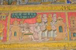 Title: Atmanatha Temple; Avudaiyarkoyil (Tirupperunturai) Date: Paintings: late 19th, early 20th centuryDescription: Third row:  Having refused the invitation of Arimarttana Pandya (Varagunavarman II) to resume his post, Manikkavachakar dedicates himself to the worship of Shiva.  Location: Tamil Nadu Temple;Atmanatha Temple;Avudaiyarkoyil Positioning: Sivananda Manikkavachakar shrine, west face