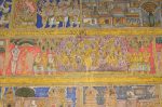 Title: Atmanatha Temple; Avudaiyarkoyil (Tirupperunturai) Date: Paintings: late 19th, early 20th centuryDescription: Third row: Manikkavachakar watches the 999 chosen ones jump into the fire and join Shiva. Location: Tamil Nadu Temple;Atmanatha Temple;Avudaiyarkoyil Positioning: Sivananda Manikkavachakar shrine, west face