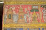 Title: Atmanatha Temple; Avudaiyarkoyil (Tirupperunturai) Date: Paintings: late 19th, early 20th centuryDescription: Third row; After the 999 chosen ones have jumped into the fire, Manikkavachakar remains behind to spread Shaivism throughout South India and visits Shaiva holy sites. Location: Tamil Nadu Temple;Atmanatha Temple;Avudaiyarkoyil Positioning: Sivananda Manikkavachakar shrine, west face