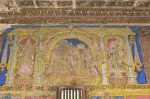Title: Atmanatha Temple; Avudaiyarkoyil (Tirupperunturai) Date: Paintings: late 19th, early 20th centuryDescription: Tyagaraja  and Nilotpalambal of Tiruvarur. On the right, king Muchukunda, on the left Kamalambal. Location: Tamil Nadu Temple;Atmanatha Temple;Avudaiyarkoyil Positioning: Sivananda Manikkavachakar shrine, prakara, south wall