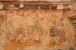 Title: Brihadishvara Temple complex; Thanjavur Date: First half of the 19th centuryDescription: Tatatakai (Minakshi) emerges from the flames of the sacrificial fire. (TP 4) Location: Tamil Nadu Temple;Brihadishvara Temple complex;Thanjavur Positioning: Courtyard, north colonnade